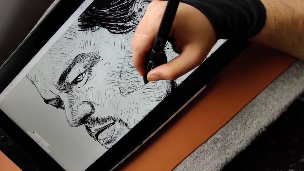 A digital artist wearing a drawing glove 